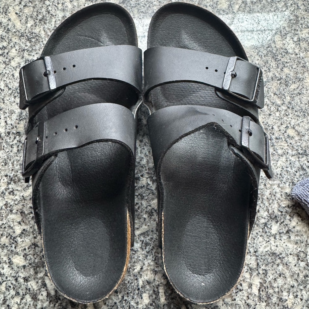 Birkenstock Black Sandals with Adjustable Straps and Contoured Footbed
